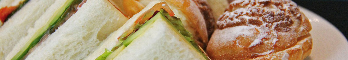 Eating Sandwich at Augusta Market restaurant in Billerica, MA.